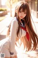 A woman in a school uniform posing for a picture.